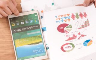 Investor Looking Over Investment Materials