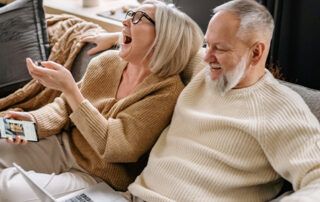 Couple on Couch - SS Benefits Timeline