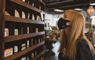Women in Store Shopping With a Mask On