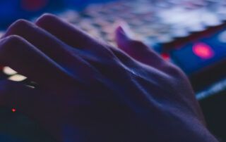 Identity Theft Protection - Hand typing on Keyboard