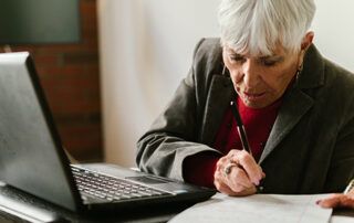 Savvy Senior Working on Computer