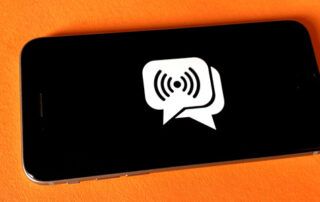 Phone with Message Icon and Orange Background