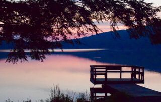 Lake Sunset with Dock and Tree Silhouette
