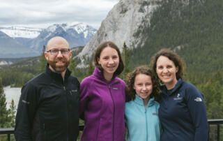 Bryan Pratt and Family in front of Mountains
