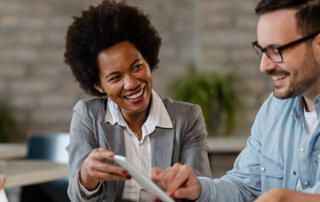 Financial Advisor Reviewing Accounts with Clients