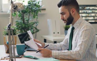 Male At Desk Job Searching