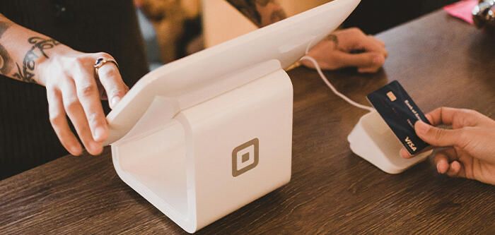 Customer Making Credit Card Purchase at Store