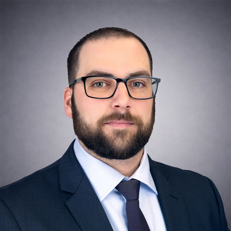 Adam Kunkel Wearing a Suit